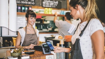 Paying using a mobile phone in a cafe